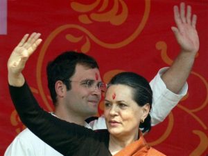 Chief of India's ruling Congress party Gandhi and its General-Secretary Gandhi wave to their supporters at Rae Bareli