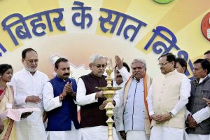 Patna : Bihar Chief Minister Nitish Kumar lighting a lamp during inauguration of two-day 'Bihar Diwas' function at Gandhi Maidan in Patna on Tuesday. PTI Photo